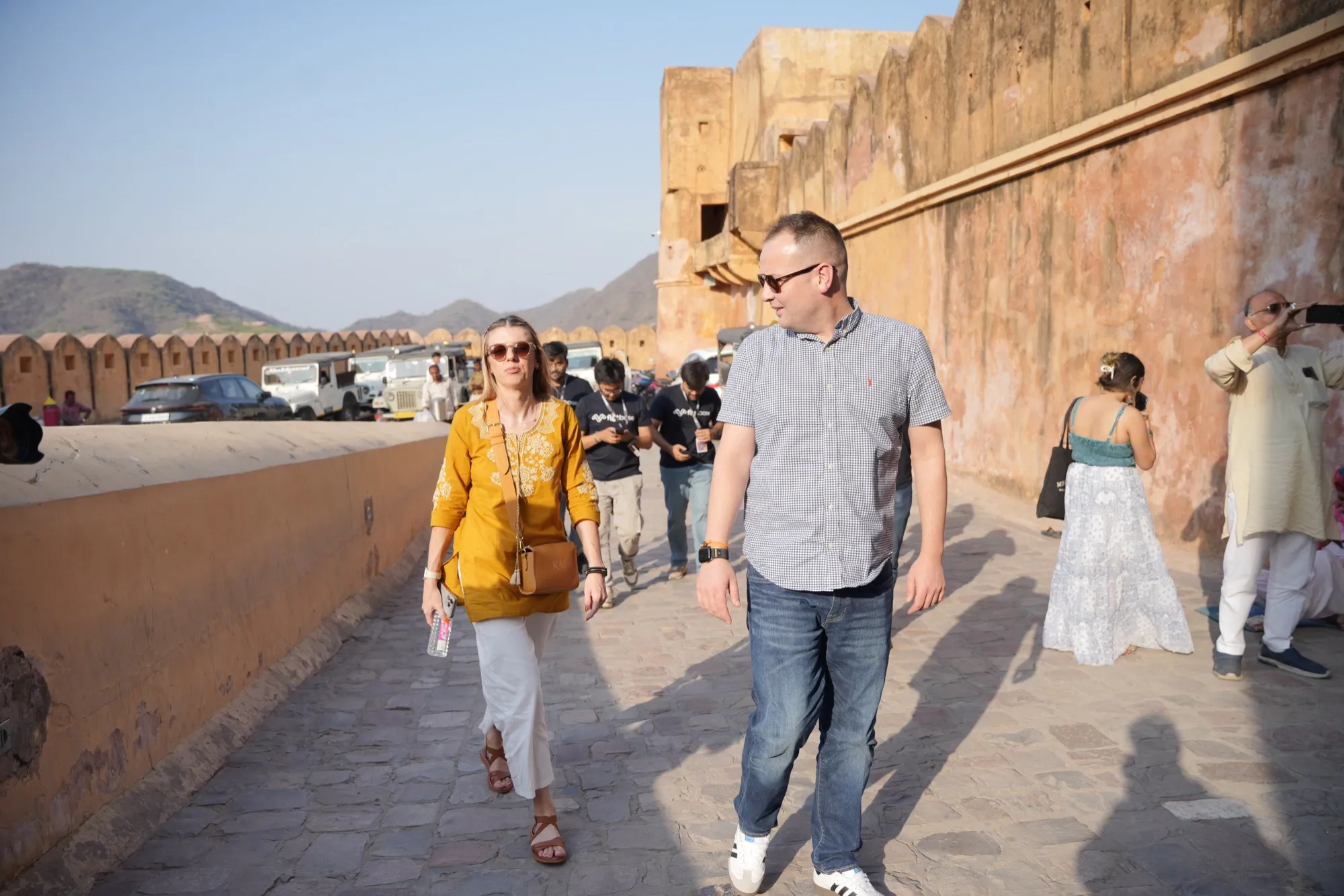 Guests walking up the ramparts of Amer Fort