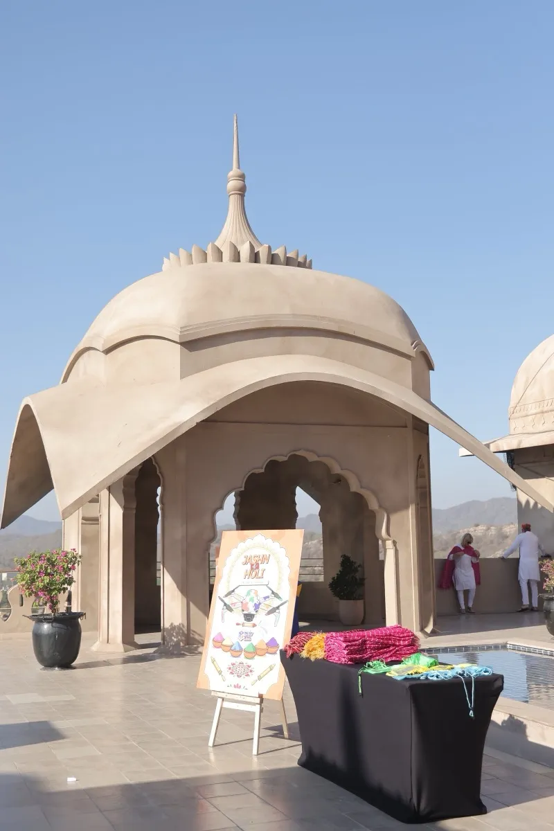 A rooftop chhatri pavilion set up for Holi