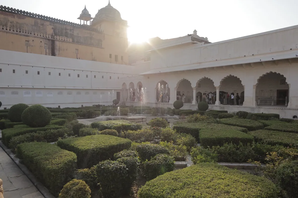 The fort’s geometric garden, the sun low over the walls