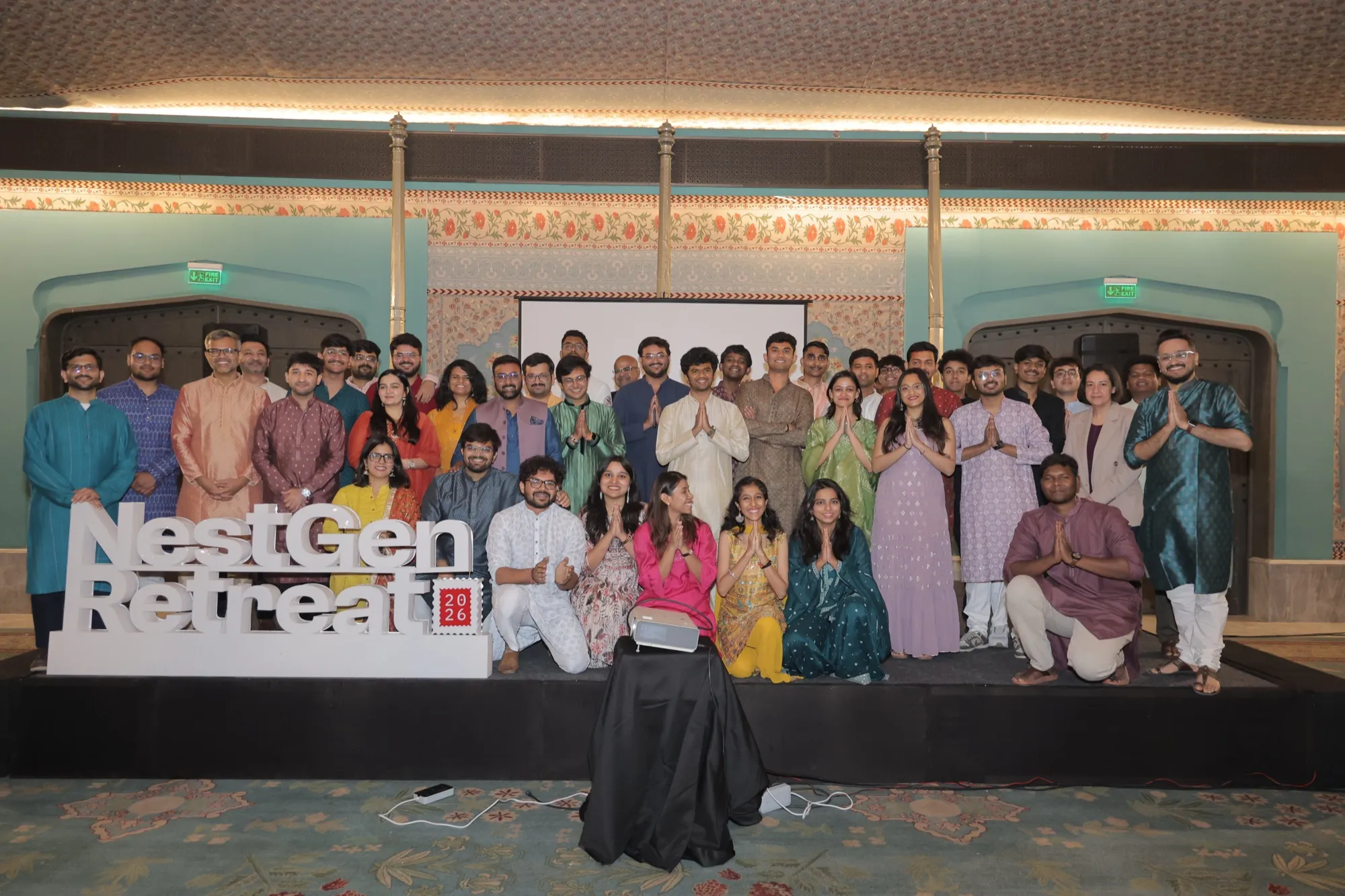 The FlytBase team and guests posed together on stage